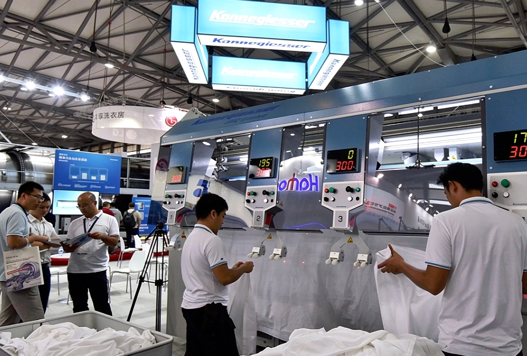 Kannegiesser laundry ironer machine on exhibition, linen feeding automation equipment
