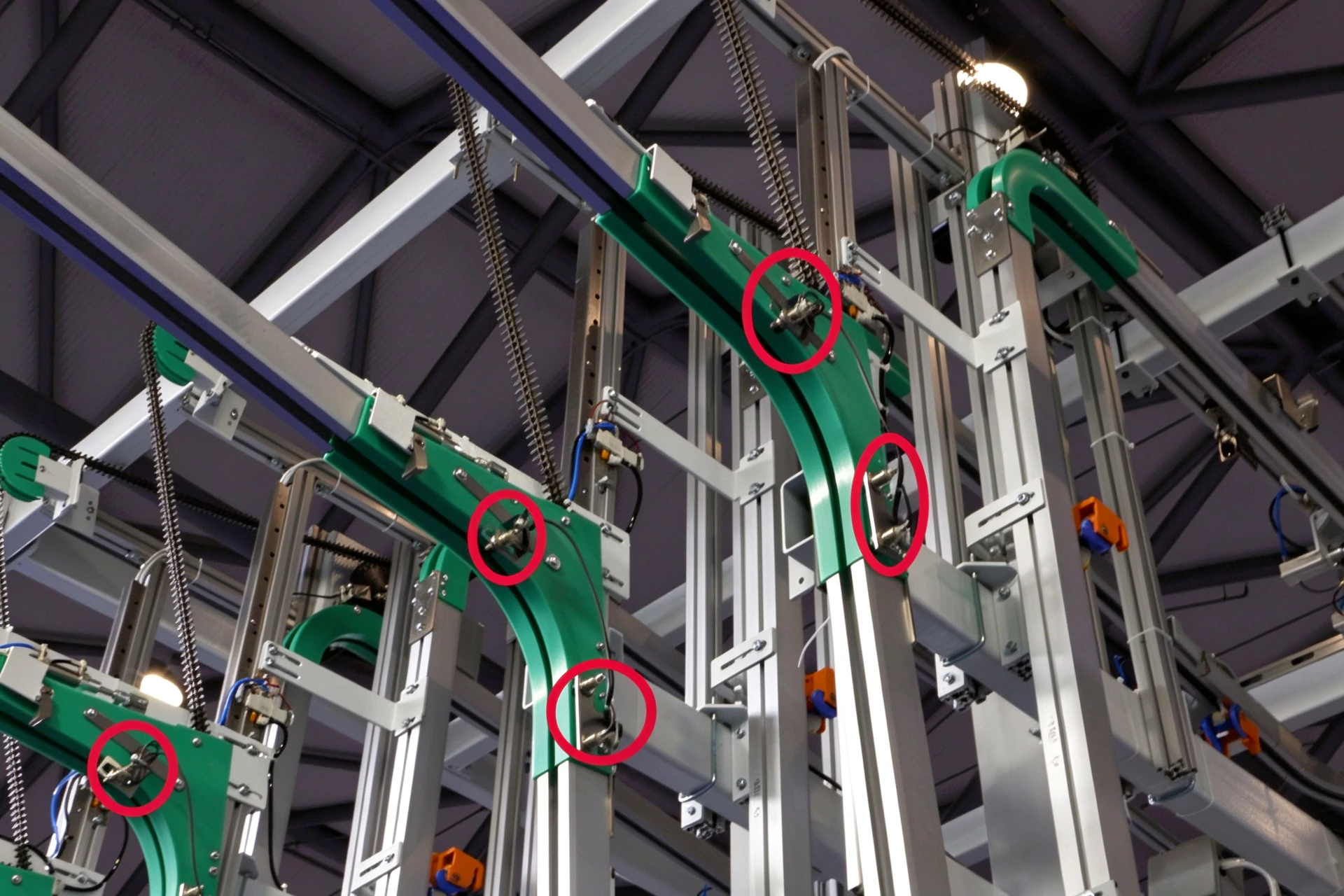 Proximity sensors on linen overhead conveyor, monitor pulley status and emergency stop for laundry line
